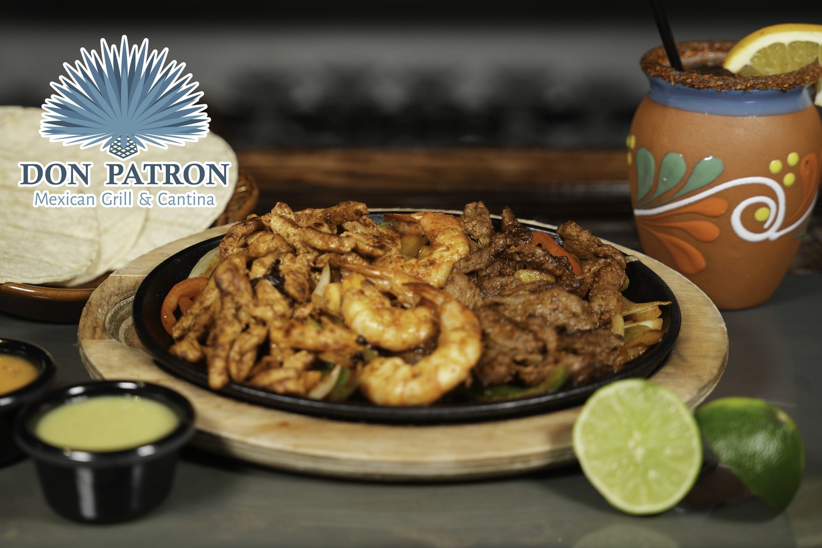 Fajitas platter with margarita